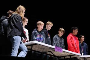 Students competing in quiz bowl.